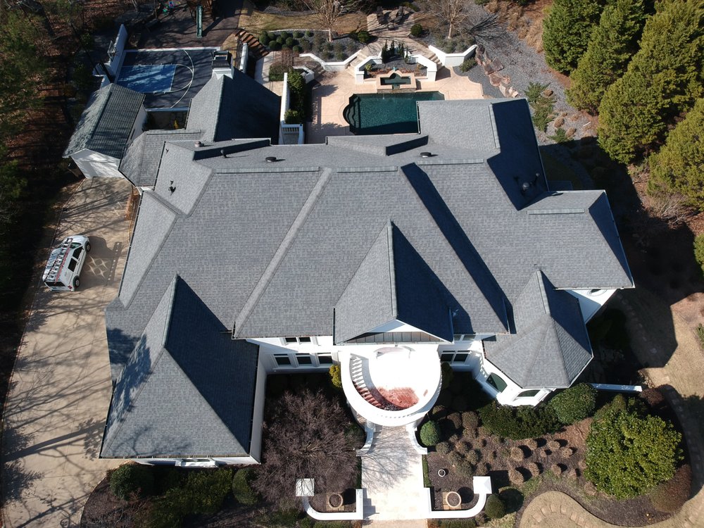 Slide of RST Roofing and Renovations