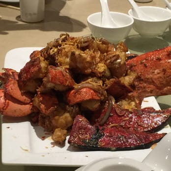 Pomelo Asian Cuisine - Lobster dipped in egg yolks then stir-fried. - Thai Near Me - Burlington, Ontario Pomelo Asian Cuisine - Lobster dipped in egg yolks then stir-fried. - Thai Near Me - Burlington, Ontario