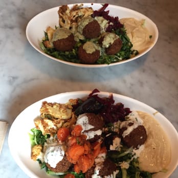 Brassica - Salad with falafel, roasted cauliflower, roasted eggplant, spiced carrots, hummus with Tahini dressing. - Mediterranean Near Me - Columbus, Ohio Brassica - Salad with falafel, roasted cauliflower, roasted eggplant, spiced carrots, hummus with Tahini dressing. - Mediterranean Near Me - Columbus, Ohio