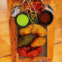 Cumin Kitchen - Fine Indian Cuisine - Pakora platter - samosas, potato cutlet, spinach and cheese cutlet, onion fritters with mint yogurt and tamarind sauce