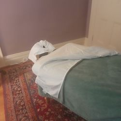 Massage Therapeutic Arts - Simple room w soothing music. A chair and small table to put personal belongings. Massage table was warm and comfortable.