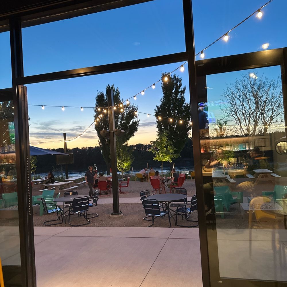 Two Birds One Stone - Patio seating right off the river. - Beer Gardens Near Me - Kansas City, Missouri Two Birds One Stone - Patio seating right off the river. - Beer Gardens Near Me - Kansas City, Missouri