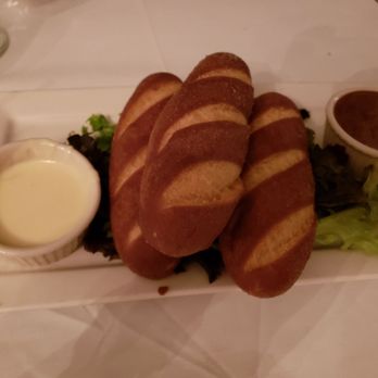 Braddock's - Pretzel appetizer served with cheese and a sweet mustard sauce. Lightly fried and perfect texture. - New American Near Me - Medford, New Jersey