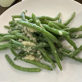 Tim Ho Wan - PF7. Garlic Green Beans Under cook and garlic still pretty raw. - Dim Sum Near Me - Katy, Texas Tim Ho Wan - PF7. Garlic Green Beans Under cook and garlic still pretty raw. - Dim Sum Near Me - Katy, Texas
