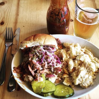 Salt + Smoke - Pulled pork sandwich (comes with an apple slaw on top), and a side of white cheddar cracker mac. - Bars Near Me - Saint Louis, Missouri Salt + Smoke - Pulled pork sandwich (comes with an apple slaw on top), and a side of white cheddar cracker mac. - Bars Near Me - Saint Louis, Missouri