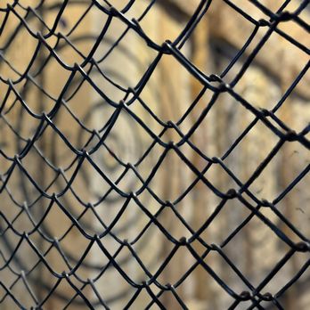 Heathens Den Axe Throwing & Ales - a close up of a chain link fence - Axe Throwing Near Me - Marion, North Carolina Heathens Den Axe Throwing & Ales - a close up of a chain link fence - Axe Throwing Near Me - Marion, North Carolina