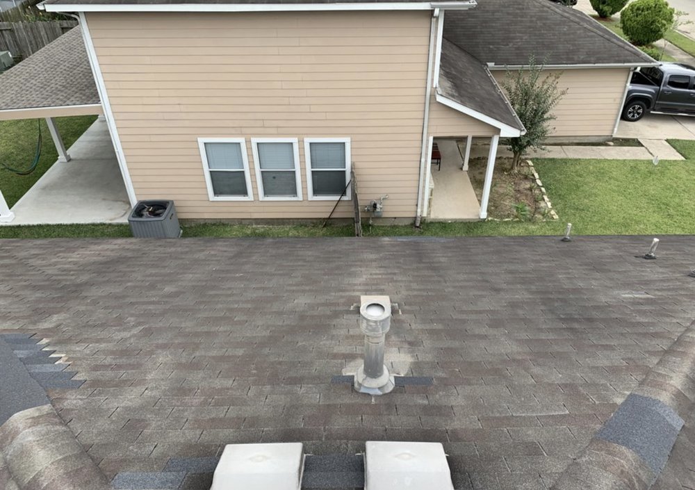 Slide of Redeemer Roofing