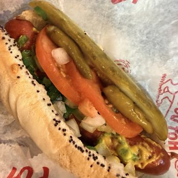 Portillo's & Barnelli's Chicago - HOT DOG with onions,relish, tomato, pickle and chili peppers - Hot Dogs Near Me - Chicago, Illinois Portillo's & Barnelli's Chicago - HOT DOG with onions,relish, tomato, pickle and chili peppers - Hot Dogs Near Me - Chicago, Illinois