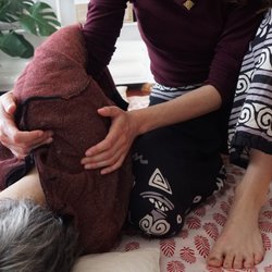 Bhavani Thai Massage Therapy - Releasing the shoulders from the side position.