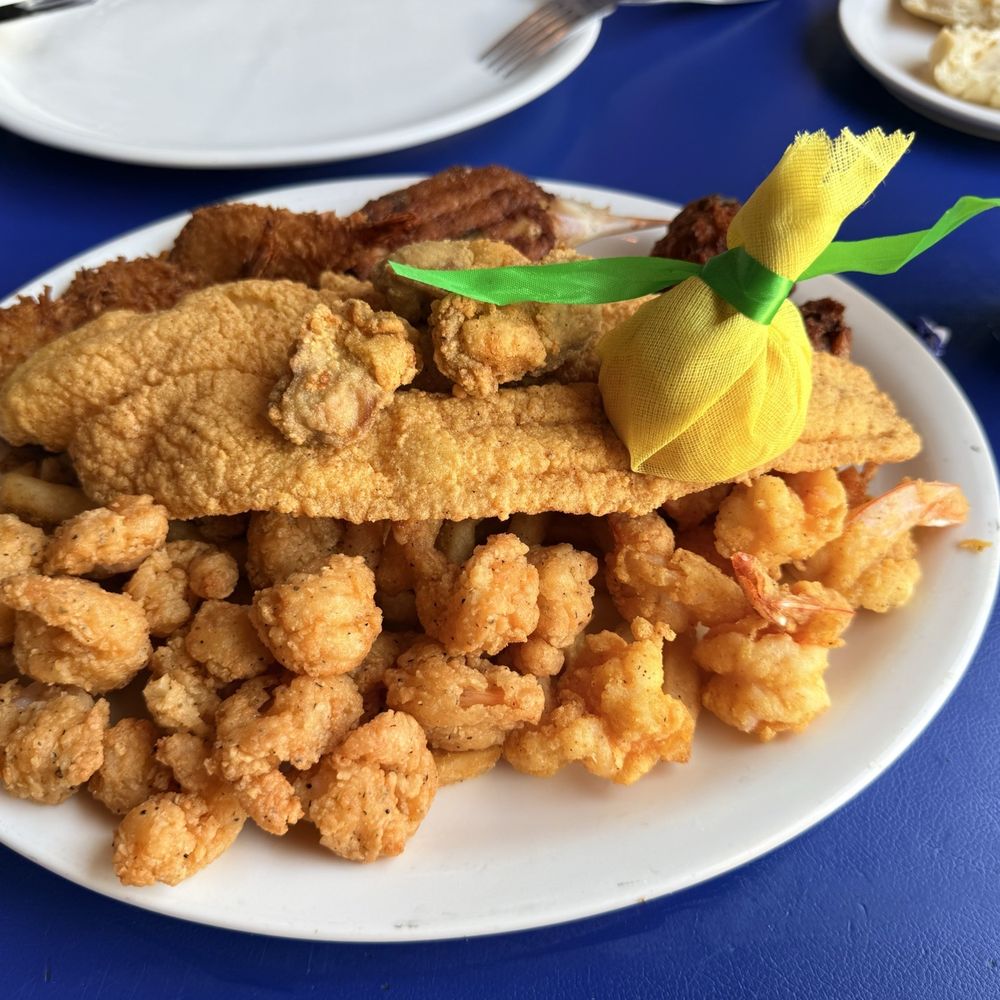 Flounder's Chowder House - Fred Flounder's Flash Fried Favorites (Popcorn shrimp side) - Seafood Near Me - Gulf Breeze, Florida Flounder's Chowder House - Fred Flounder's Flash Fried Favorites (Popcorn shrimp side) - Seafood Near Me - Gulf Breeze, Florida