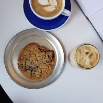 Singing Sun Coffee - Hot oat milk latte, chocolate chip cookie, and lavender drink - Coffee & Tea Near Me - Ventura, California Singing Sun Coffee - Hot oat milk latte, chocolate chip cookie, and lavender drink - Coffee & Tea Near Me - Ventura, California