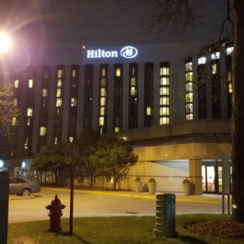 Hilton Rosemont/Chicago O'Hare - Exterior at night - Hotels Near Me - Rosemont, Illinois Hilton Rosemont/Chicago O'Hare - Exterior at night - Hotels Near Me - Rosemont, Illinois