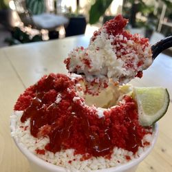 Elote - Corn in a bowl with Mayo, cheese, hot sauce and hot Cheetos!