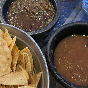 Adobe Grill - Chips and salsa. Dark salsa was the house salsa and requested the habanero salsa as shown in front. - Mexican Near Me - La Quinta, California Adobe Grill - Chips and salsa. Dark salsa was the house salsa and requested the habanero salsa as shown in front. - Mexican Near Me - La Quinta, California
