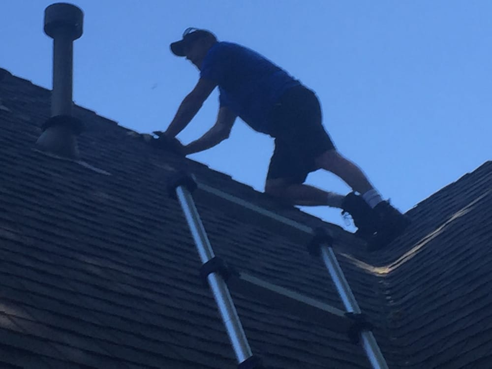 Slide of Windtop Roofing