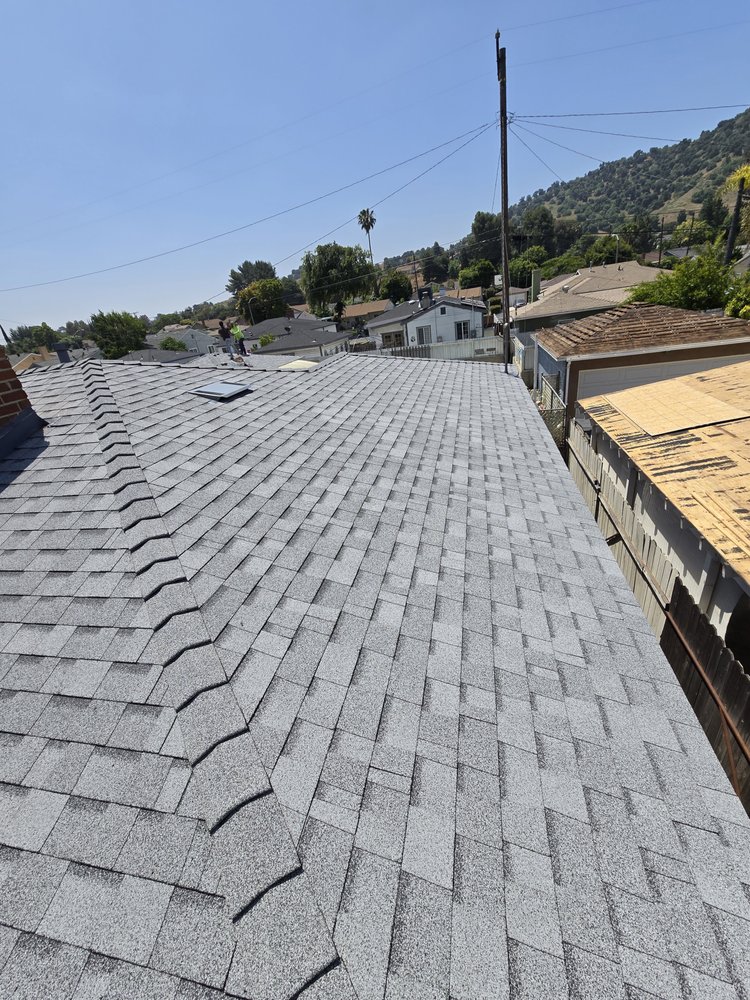 Slide of Eminent Roofing