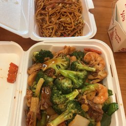 two takeout containers of food two takeout containers of food