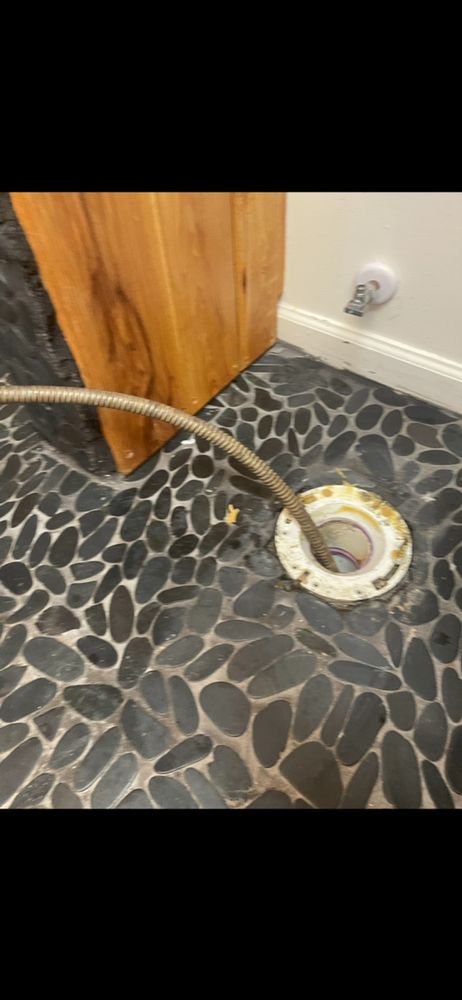 Slide of Black Pressure Washing & Plumbing Services