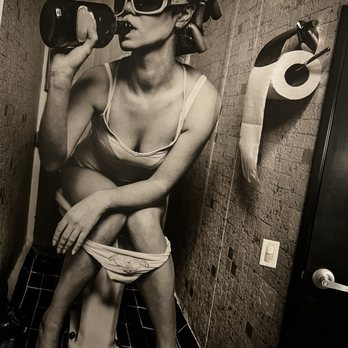 Dollies Bar & Grill - Love the woman restroom wall - Comfort Food Near Me - Corona, California Dollies Bar & Grill - Love the woman restroom wall - Comfort Food Near Me - Corona, California