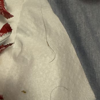 Five Guys - The hairs found after just a few bites in. Bars were found back to back. - Burgers Near Me - Owensboro, Kentucky