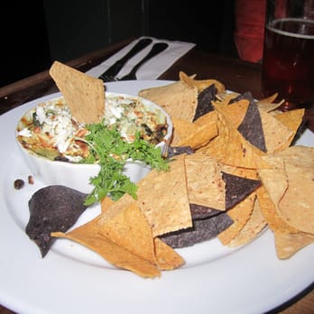 Corner Social - SPINACH , LEEK AND ROASTED ARTICHOKE DIP - New American Near Me - New York, New York Corner Social - SPINACH , LEEK AND ROASTED ARTICHOKE DIP - New American Near Me - New York, New York