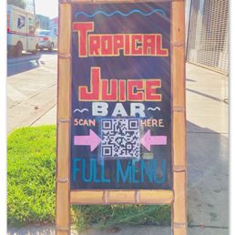 Street board sign Tropical Juice bar. #mexicanestilo