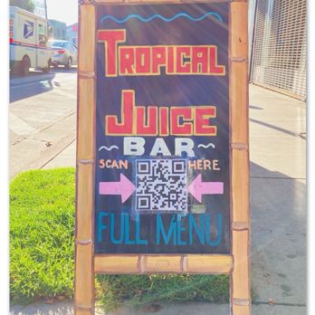 Tropical Juice LA - Street board sign Tropical Juice bar. #mexicanestilo - Juice Bars & Smoothies Near Me - Highland Park, California