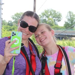 RYZE Adventure Park - Mother and Daughter getting ready to climb