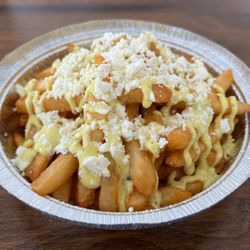 Go Pita - Loaded Fries topped with house made zesty mayo and feta cheese