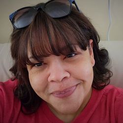 Yeimy's Dominican Hair Studio - New cut with bangs, blowout, and curled