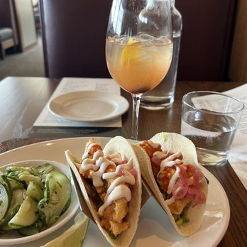 Burtons Grill & Bar - Fish tacos with cucumber salad. White Sangria - New American Near Me - Gaithersburg, Maryland