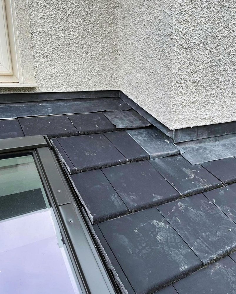 Slide of Tobin Hill Roofing