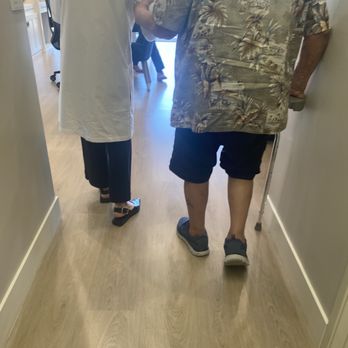 OC Optometry Group - Dr. E lending an arm to my 95 year-old grandfather. - Optometrists Near Me - Newport Beach, California OC Optometry Group - Dr. E lending an arm to my 95 year-old grandfather. - Optometrists Near Me - Newport Beach, California