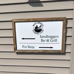 Sandbaggers Bar And Grill - Small sign at entrance