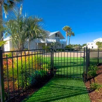 Landscape Transformations - a fenced yard with palm trees - Landscaping Near Me - Myrtle Beach, South Carolina Landscape Transformations - a fenced yard with palm trees - Landscaping Near Me - Myrtle Beach, South Carolina