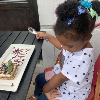 Bono Trattoria - My daughter with BoNo's delicious tiramisu - Pizza Near Me - New York, New York