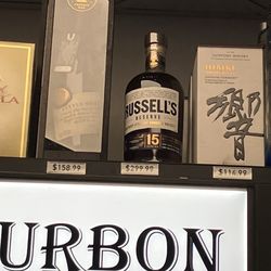 Chuck's Liquor, Beer & Snacks - Amazed to find a Russell's 15 for only $299.  Great selection and friendly staff.