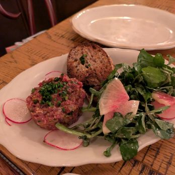 Steak Frites Bistro - Steak tartare, comes with radiccio and greens - Steakhouses Near Me - New York, New York