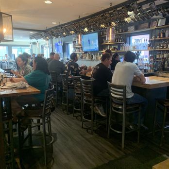 Revolution Taproom & Grill - Interior at happy hour - Gastropubs Near Me - Rochester, New Hampshire Revolution Taproom & Grill - Interior at happy hour - Gastropubs Near Me - Rochester, New Hampshire