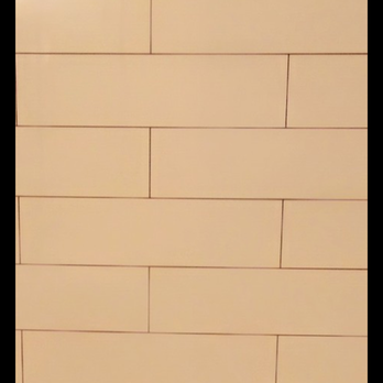 Smith & Koby Construction - a white brick wall - Carpenters Near Me Smith & Koby Construction - a white brick wall - Carpenters Near Me