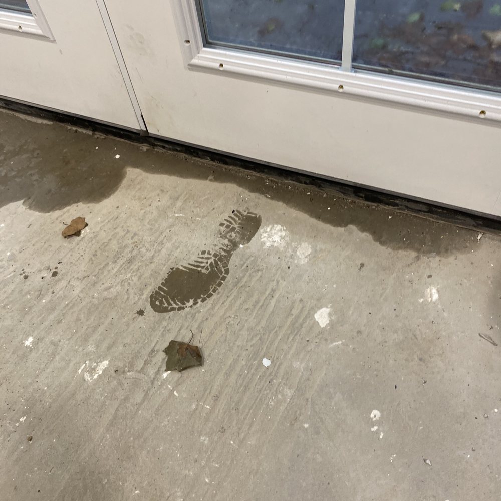 Solid Rock Builders - water coming into our mudroom because he didn't using a sill pan, or silicone to set the door, which is so not plum or level. HACK!!! - Masonry/Concrete Near Me Solid Rock Builders - water coming into our mudroom because he didn't using a sill pan, or silicone to set the door, which is so not plum or level. HACK!!! - Masonry/Concrete Near Me