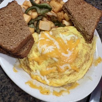 Christy's Bar & Grill - Denver omelet with cubed potatoes & wheat toast - Dive Bars Near Me - Renton, Washington Christy's Bar & Grill - Denver omelet with cubed potatoes & wheat toast - Dive Bars Near Me - Renton, Washington