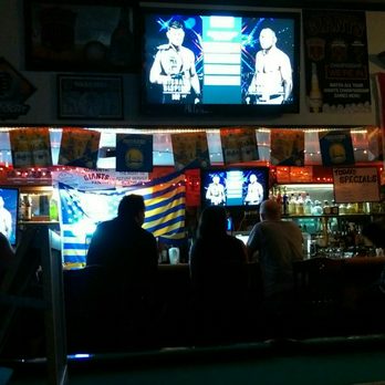 The Lariat Tavern - Bisping vs. Henderson from comfy couch seats. - Sports Bars Near Me - Belmont, California