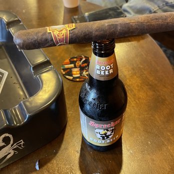 Cordova Cigars - a cigar and a bottle of beer - Tobacco Shops Near Me - Pensacola, Florida