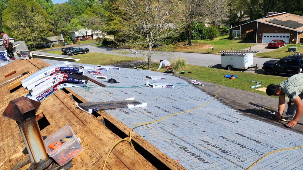 Slide of JS Roofing Group