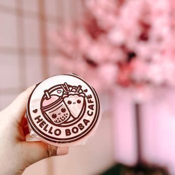 Hello Boba Cafe - a hand holding a donut - Bubble Tea Near Me - Macon, Georgia Hello Boba Cafe - a hand holding a donut - Bubble Tea Near Me - Macon, Georgia