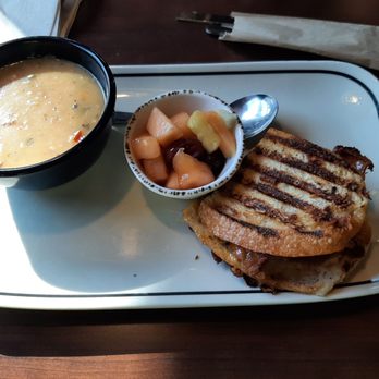 Corner Bakery Cafe - Club panini (half size) with a cup of chicken orzo soup and a cup of fruit. - Soup Near Me - San Antonio, Texas