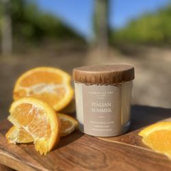Flowers In The Alley - Escape to the sun-drenched shores of Italy with our refreshing citrus candle. Savor the zesty scent today!