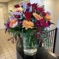 Candlelight And Roses - Absolutely the most beautiful arrangement of flowers I have ever received from my husband. Such a breathtaking array of beauty.