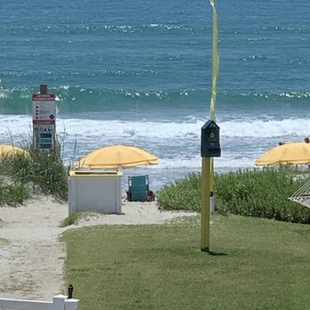Seahawk Inn & Villas - Umbrella and chair view - Hotels Near Me - Atlantic Beach, North Carolina